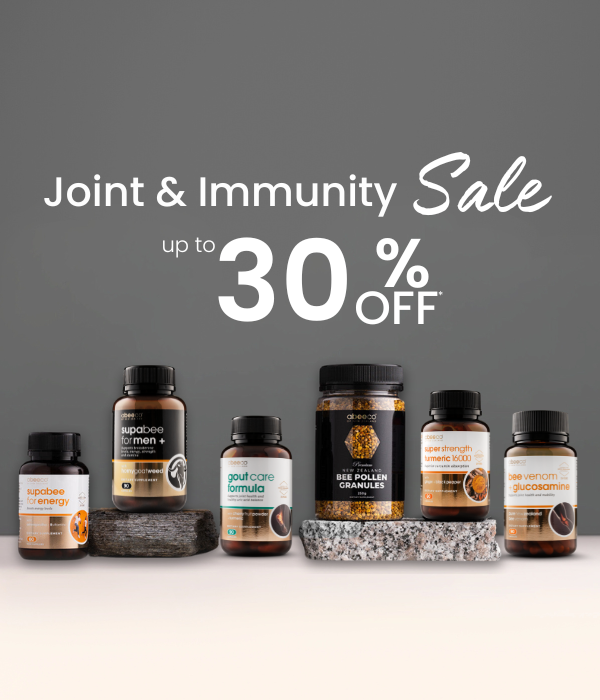 Supplement bottles with 'Joint & Immunity Sale' text on a gray background