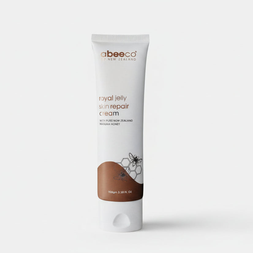Tube of abeeeo royal jelly skin repair cream on a white background