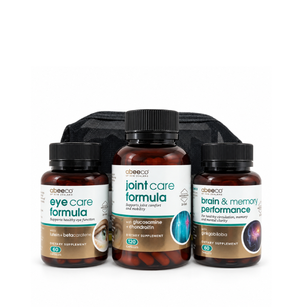 Three amber supplement bottles with black caps and white labels from abecao, arranged in front of a black zip pouch on a white background. The bottles are labeled eye care formula, joint care formula, and brain & memory performance.